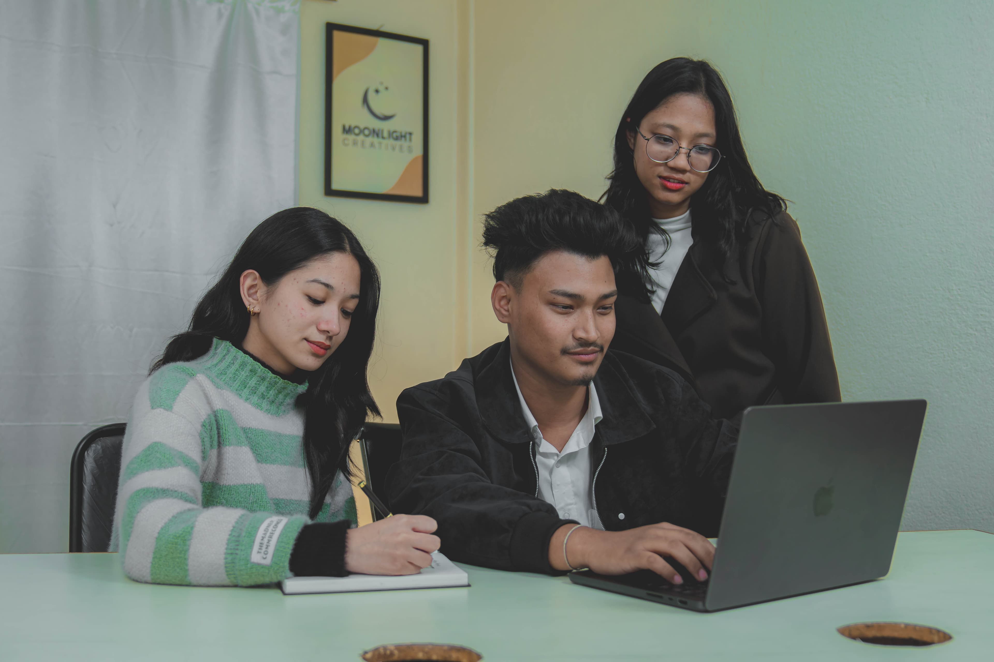 Moonlight Creatives team planning digital growth strategy